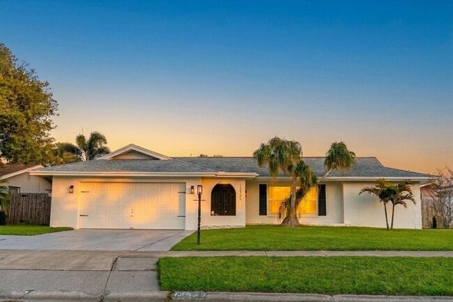 property at 13923 Brewster Dr