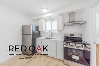 211 1/2 W 47th St in Los Angeles, CA - Building Photo - Building Photo