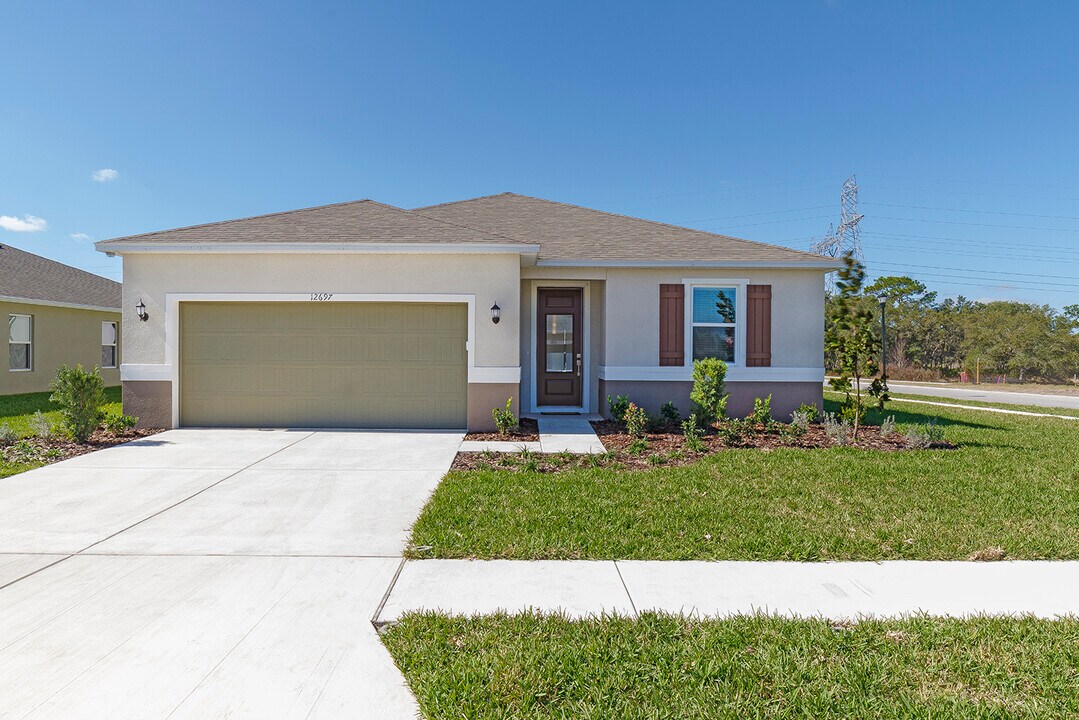 12697 Achasta Blvd in Hudson, FL - Building Photo
