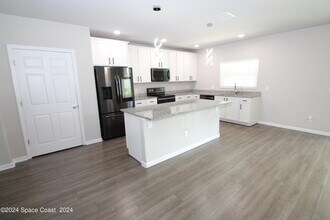 695 Boughton Way in West Melbourne, FL - Building Photo - Building Photo