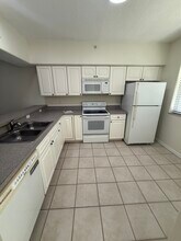 90 San Juan Dr, Unit B-103 in Palm Coast, FL - Building Photo - Building Photo