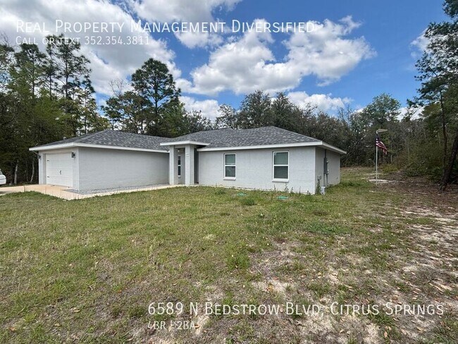 6589 N Bedstrow Blvd in Citrus Springs, FL - Foto de edificio - Building Photo