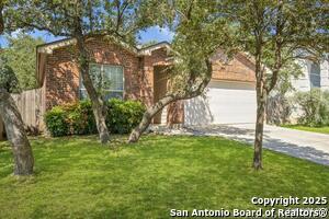 13715 Riverbank Pass in Helotes, TX - Building Photo