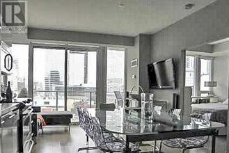 126 Simcoe St in Toronto, ON - Building Photo - Building Photo