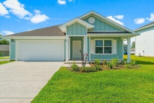 453 Riverwalk Cir in Freeport, FL - Building Photo
