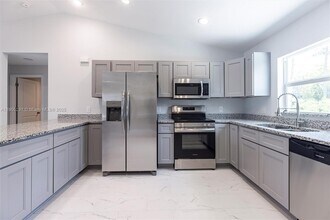 2004 Rosa Ct in Lehigh Acres, FL - Building Photo - Building Photo
