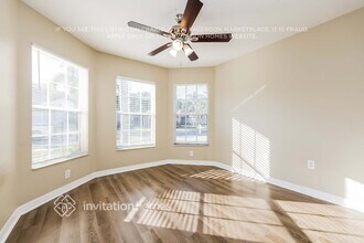 7128 Royal George Ct, Unit 1-L301 in Wesley Chapel, FL - Foto de edificio - Building Photo