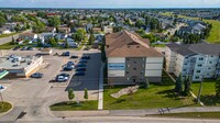 10521-10584 84 Ave in Grande Prairie, AB - Building Photo - Building Photo