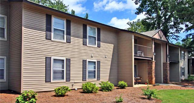 The Woodlands Apartments in Florence, AL - Building Photo - Building Photo