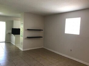 3790 N Jog Rd, Unit 106 in West Palm Beach, FL - Building Photo - Building Photo