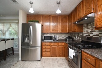 7514 Split Oak Ct in Houston, TX - Foto de edificio - Building Photo