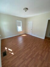 213 Dana Ave, Unit 1 in Boston, MA - Foto de edificio - Building Photo