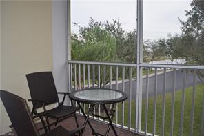 1380 Sweetwater Cove-Unit -202 in Naples, FL - Building Photo