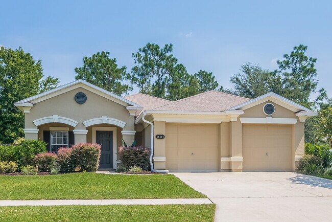 property at 11311 Justin Oaks Dr N