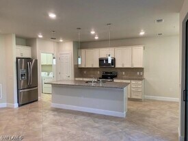 5701 Mayflower Way in Ave Maria, FL - Building Photo