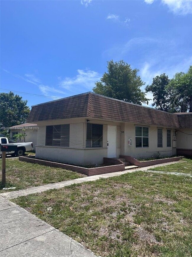 property at 50 SE 13th St