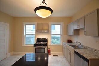 10 Bucknam St, Unit 1 in Boston, MA - Building Photo - Building Photo