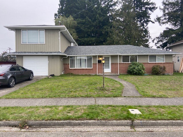 1611 S Geiger St in Tacoma, WA - Foto de edificio
