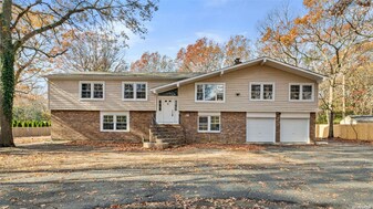 00 hidden for privacy in Holtsville, NY - Building Photo