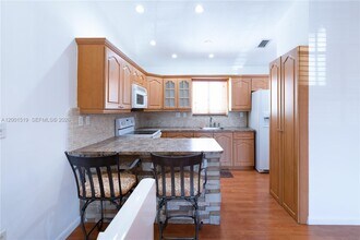 10017 W Okeechobee Rd in Hialeah Gardens, FL - Building Photo - Building Photo