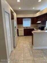2087 Hidden Grove Ln in Merritt Island, FL - Foto de edificio - Building Photo
