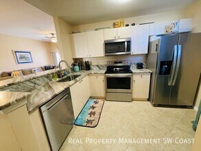 15449 Bellamar Cir in Ft. Myers, FL - Building Photo - Building Photo