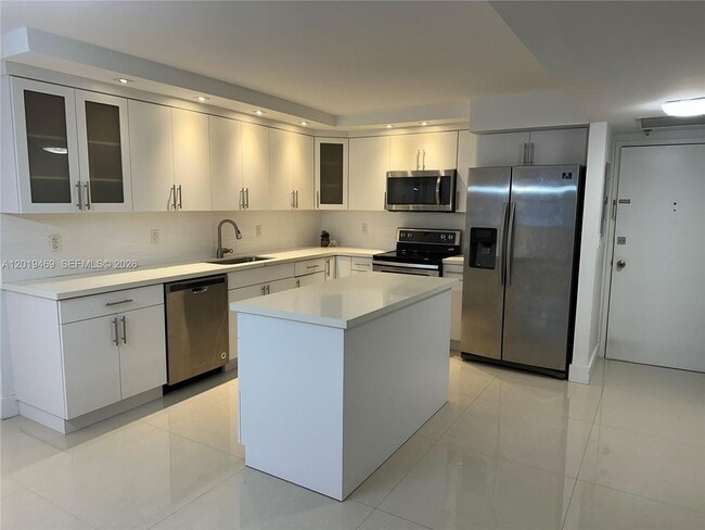 property at 6039 Collins Ave