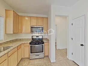 14223 W Country Gables Dr in Surprise, AZ - Building Photo - Building Photo