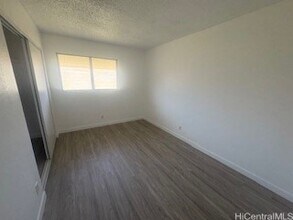 98-1370 Koaheahe Place Unit 164 in Pearl City, HI - Building Photo - Building Photo