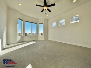 Gorgeous 4 bed 3 bath + Office home located on the 12th Tee of the TPC golf Course! in Berthoud, CO - Building Photo - Building Photo