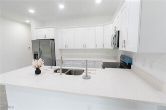 873 Duplex St E in Lehigh Acres, FL - Building Photo - Building Photo