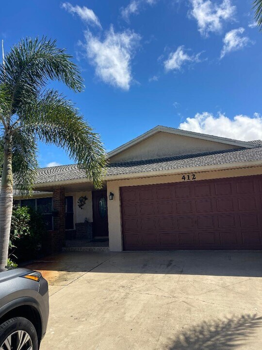 412 SW Sansom Ln in Port St. Lucie, FL - Building Photo