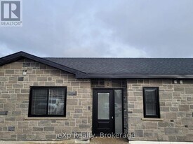 12 Malcolm Cres in North Perth, ON - Building Photo