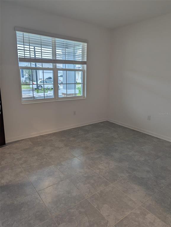 657 Trotters Dr, Unit B in Eagle Lake, FL - Building Photo - Building Photo