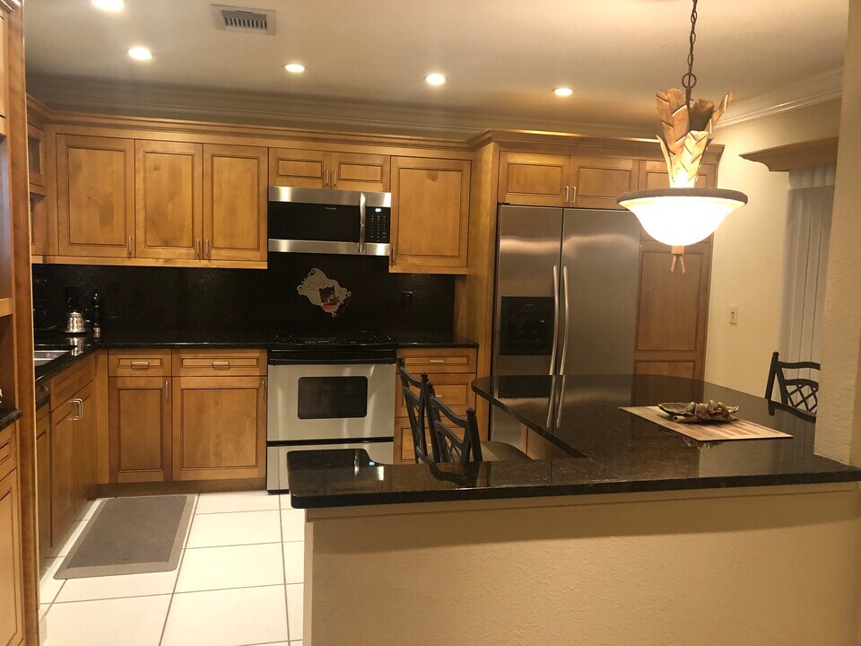1055 Kensington Park Dr, Unit 203 in Altamonte Springs, FL - Building Photo