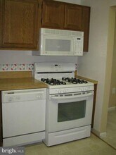 1427 Northgate Square-Unit -32B in Reston, VA - Building Photo - Building Photo