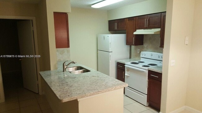 property at 10452 NW 8th St