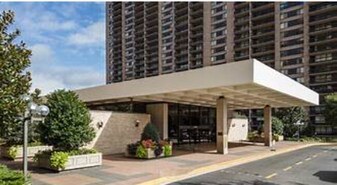 3701 S George Mason Dr, Unit 309-N in Falls Church, VA - Building Photo