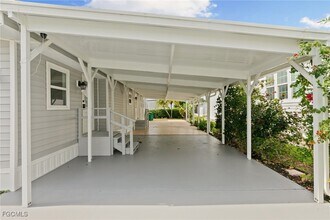 57 San Remo Cir in Naples, FL - Building Photo - Building Photo