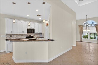 25080 Divot Dr in Bonita Springs, FL - Building Photo - Building Photo