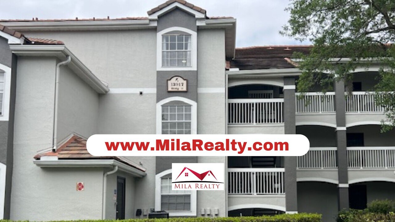 13917 Fairway Island Dr in Orlando, FL - Building Photo