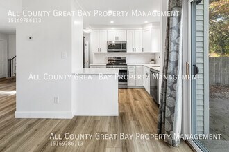 921 Church St in Bohemia, NY - Building Photo - Building Photo