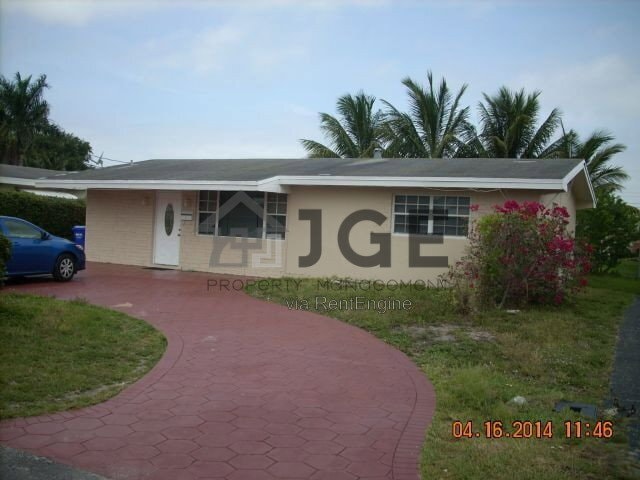 property at 7681 NW 13th St