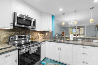 7684 NW 18th St, Unit 408 in Margate, FL - Foto de edificio - Building Photo