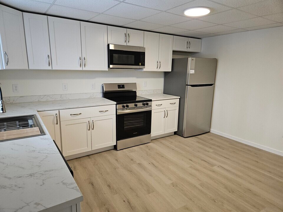 47 Highland St in Plymouth, NH - Building Photo