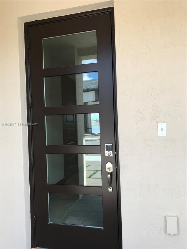 property at 15981 NW 91st Ct