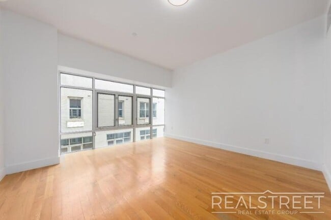 property at 90-02 Queens Blvd