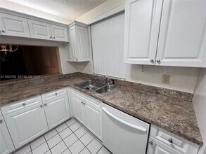 10426 E Clairmont Cir in Tamarac, FL - Building Photo - Building Photo