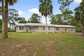16932 Okeechobee Blvd in The Acreage, FL - Foto de edificio - Building Photo