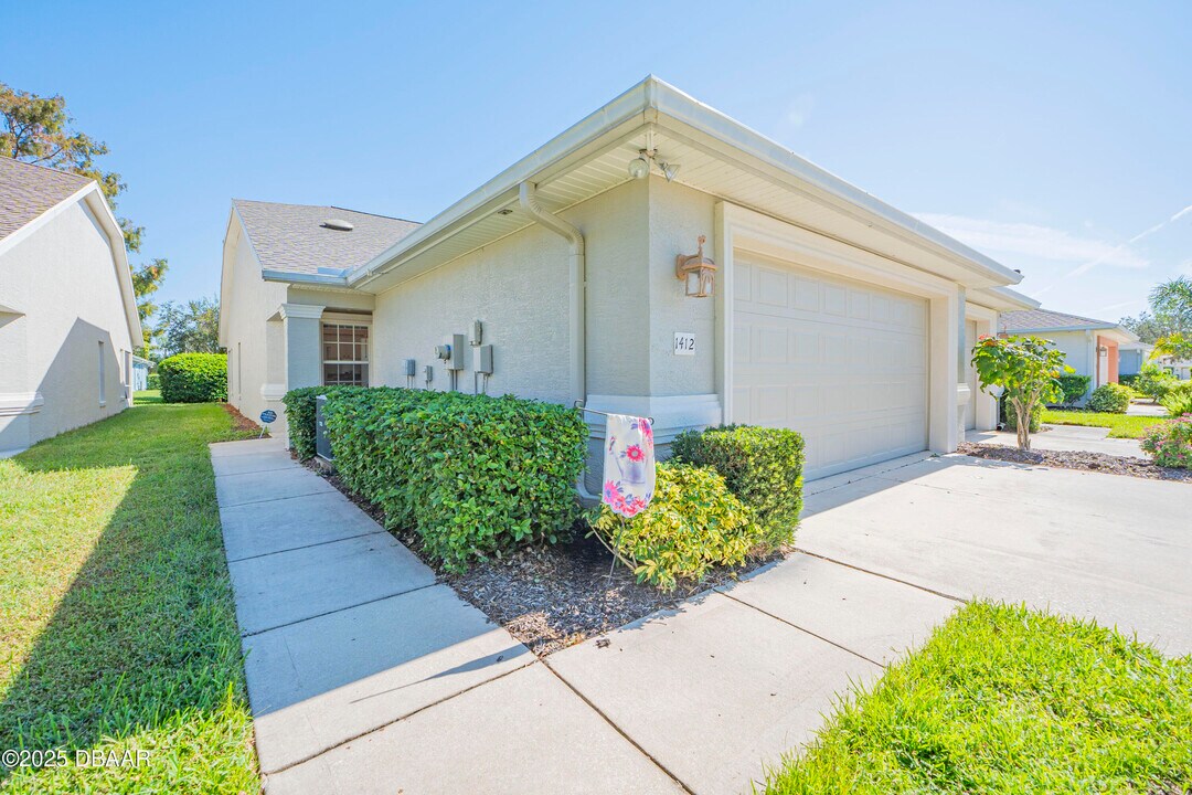1412 Coconut Palm Cir in Port Orange, FL - Building Photo